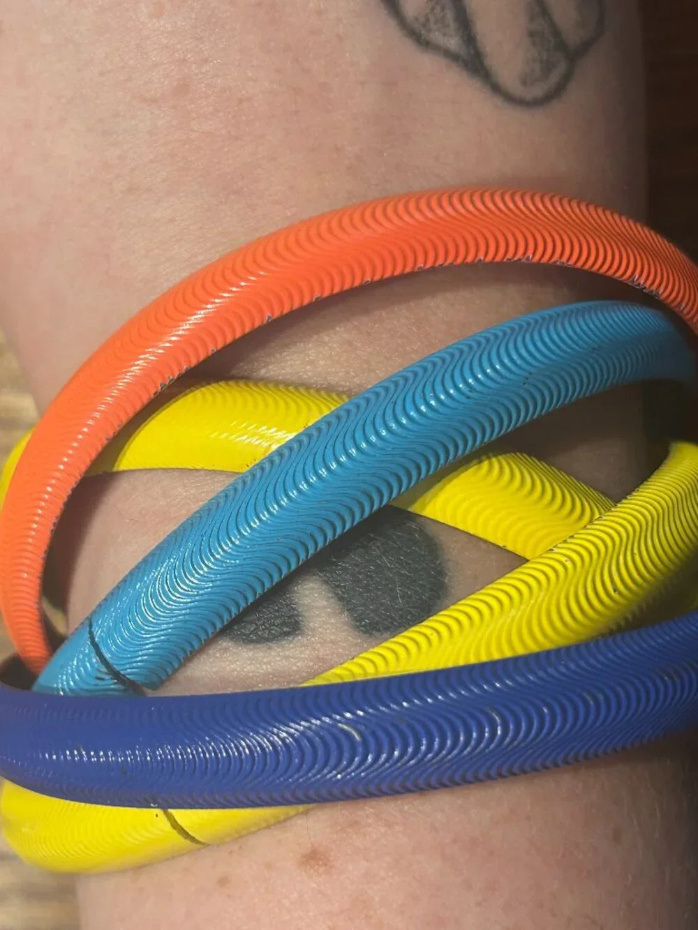 Vintage Metal Yellow, Orange, and Blue Bangle Set